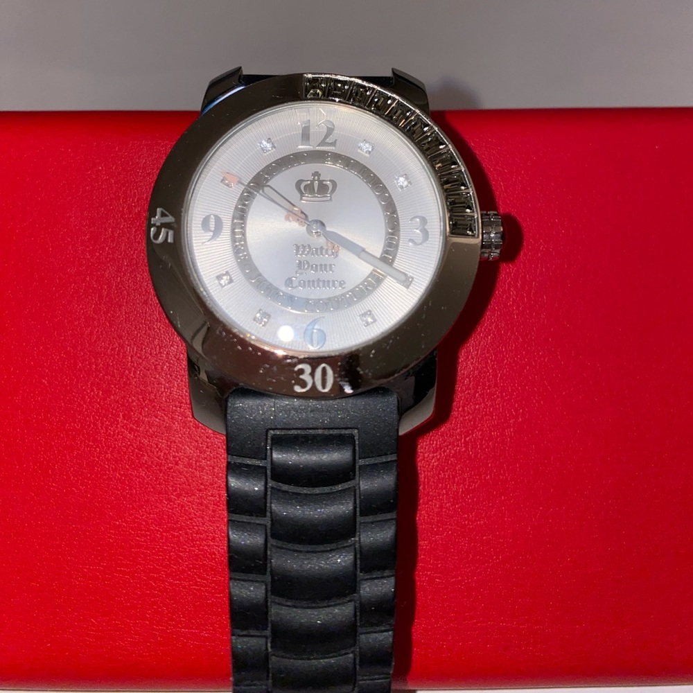 Juicy couture watch. Classic black with partial diamond bezel. Used.